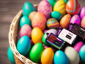 Wulf Recon vaporizers resting in an Easter egg basket