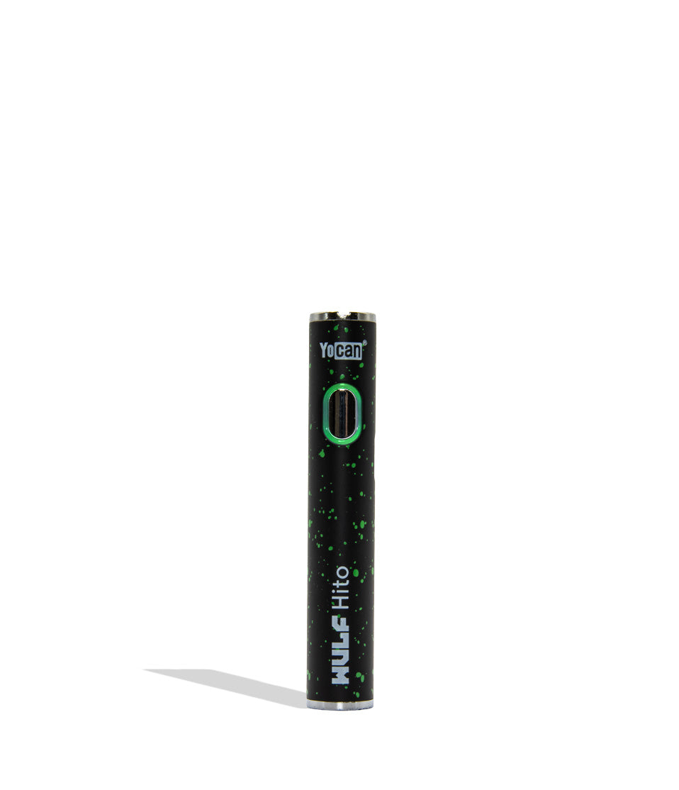 Yocan WULF Mods Hito vape device 510 battery with a glowing green power button, standing upright on a white background with a soft shadow. Black green spatter color.
