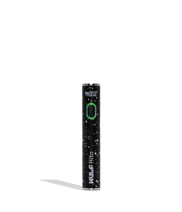 Yocan WULF Mods Hito vape device 510 battery with a glowing green power button, standing upright on a white background with a soft shadow. Black white spatter color.