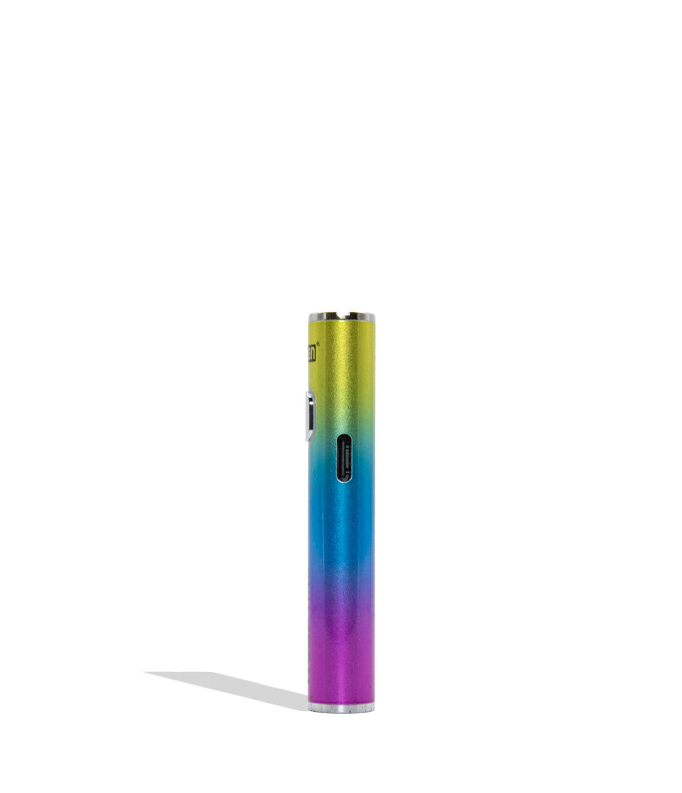 A slim cylindrical vape device with a metallic rainbow gradient transitioning from yellow-green to blue and purple, standing upright on a white background with a soft shadow.