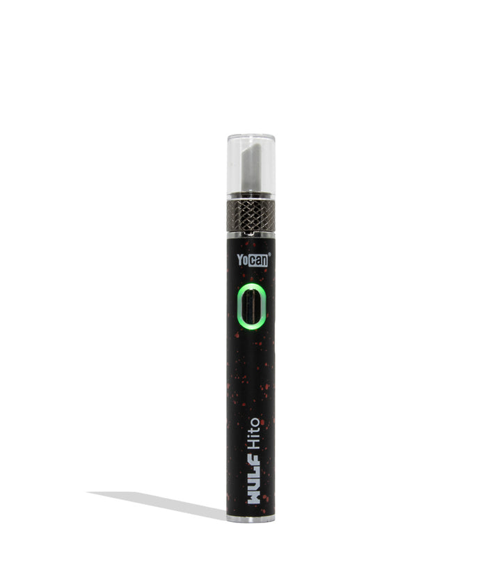 Yocan WULF Mods Hito Knife Kit device 510 battery with a glowing green power button, standing upright on a white background with a soft shadow. black red spatter