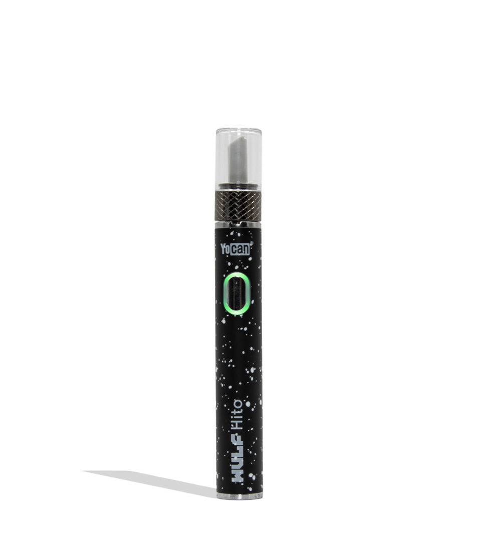 Yocan WULF Mods Hito Knife Kit device 510 battery with a glowing green power button, standing upright on a white background with a soft shadow. black white spatter
