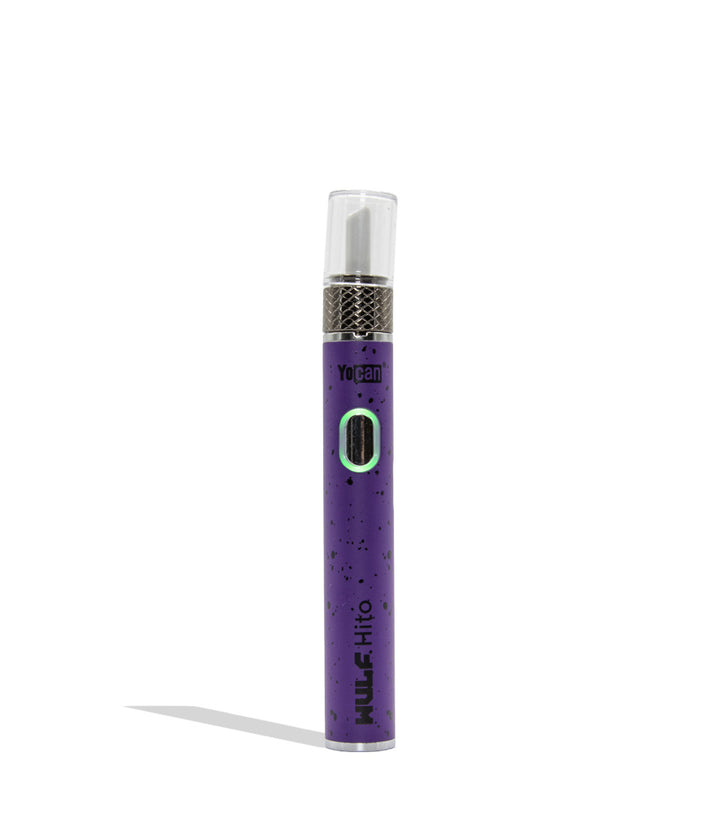 Yocan WULF Mods Hito Knife Kit device 510 battery with a glowing green power button, standing upright on a white background with a soft shadow. Purple blackl spatter