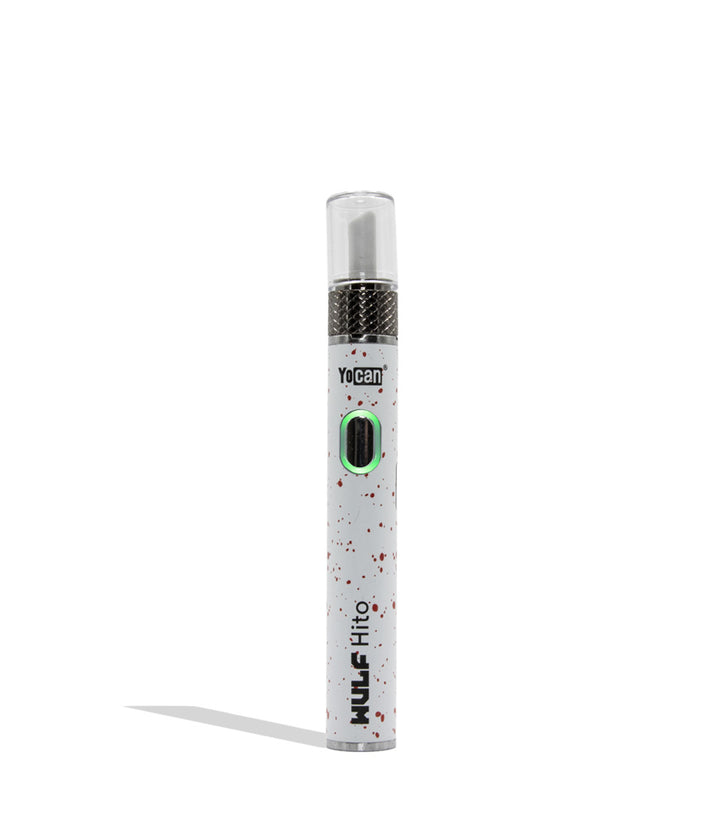 Yocan WULF Mods Hito Knife Kit device 510 battery with a glowing green power button, standing upright on a white background with a soft shadow. White red spatter