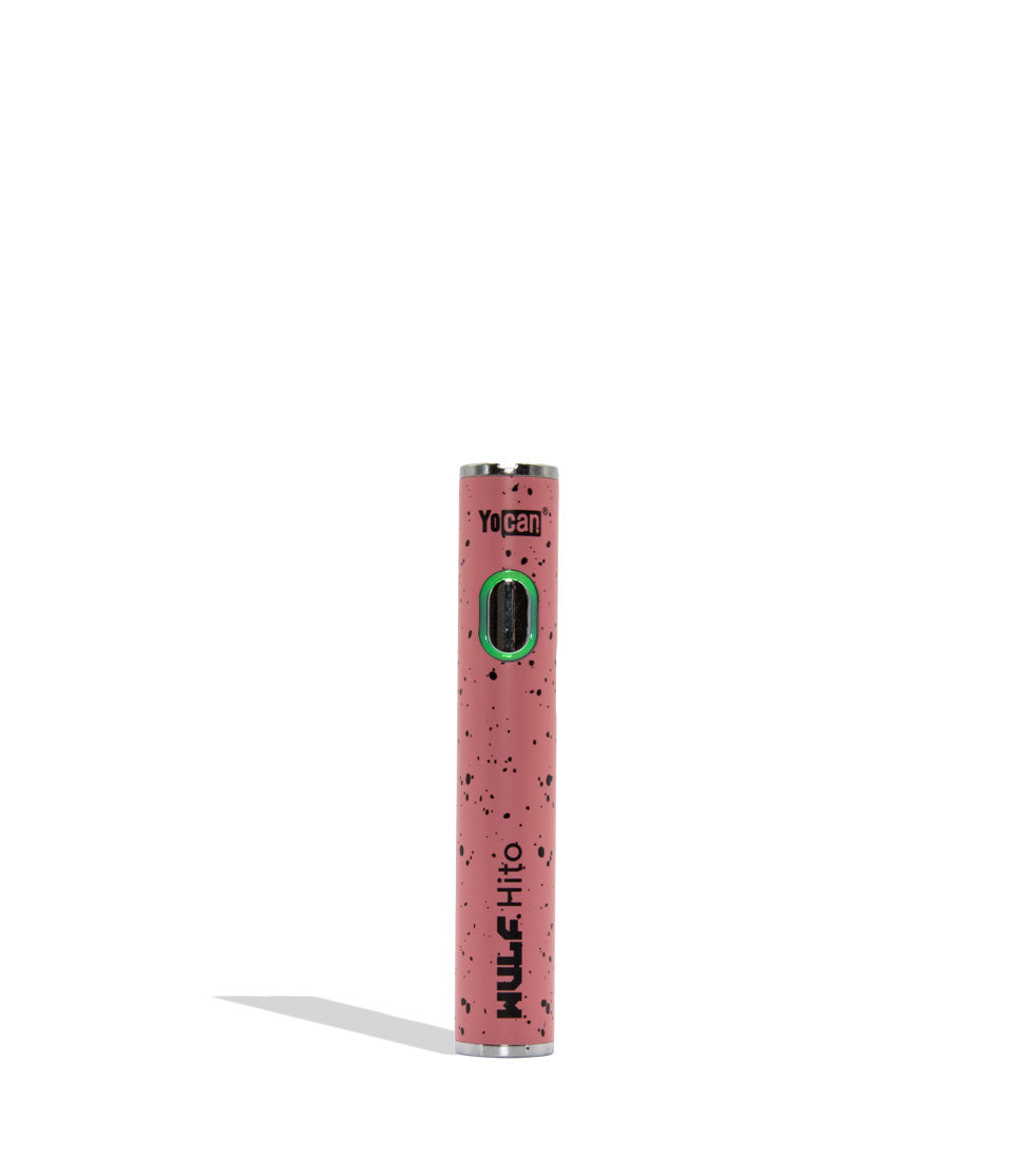 Yocan WULF Mods Hito vape device 510 battery with a glowing green power button, standing upright on a white background with a soft shadow. Pink black spatter color.
