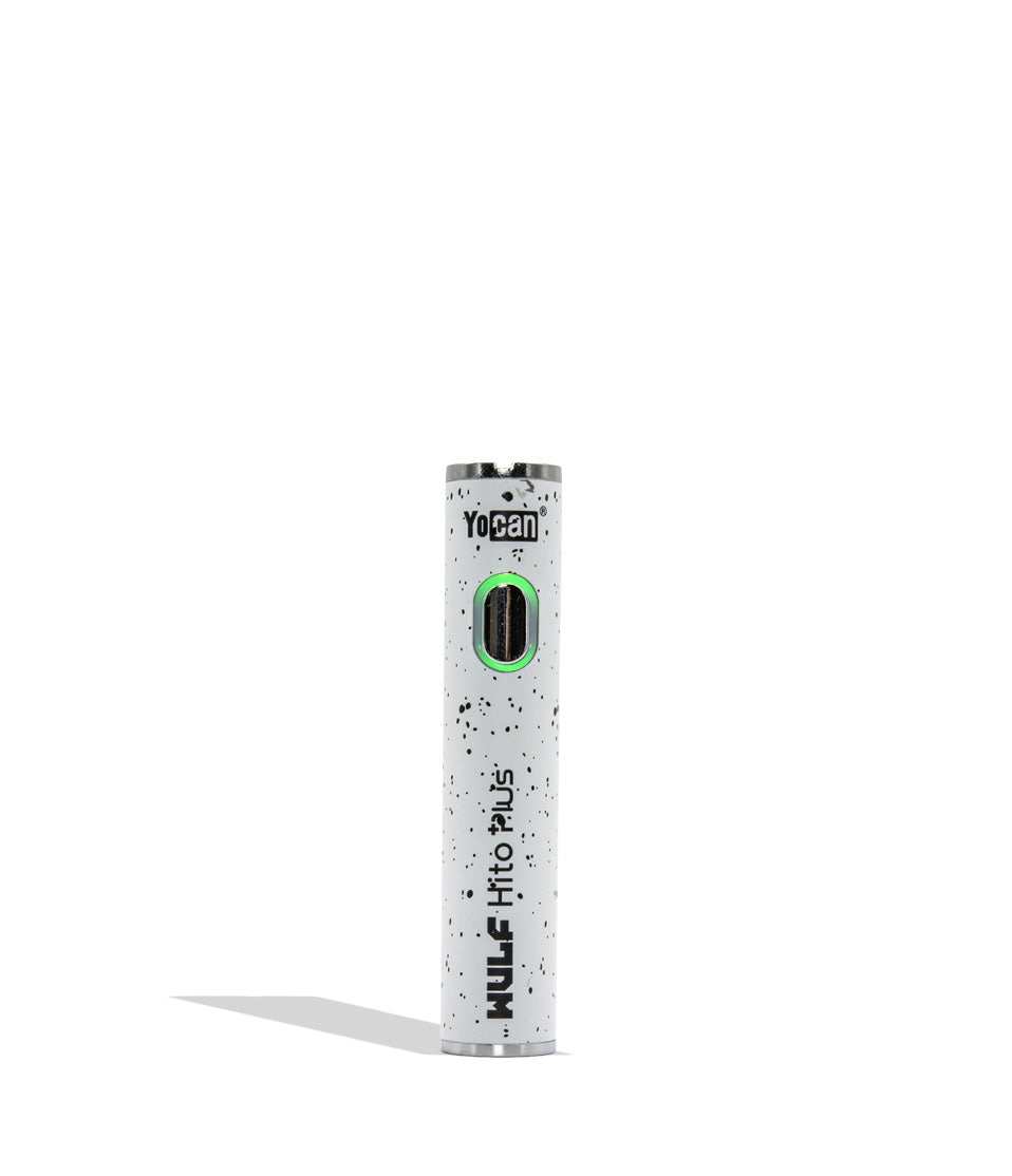 Yocan WULF Mods Hito Plus vape device 510 battery with a glowing green power button, standing upright on a white background with a soft shadow. White black spatter
