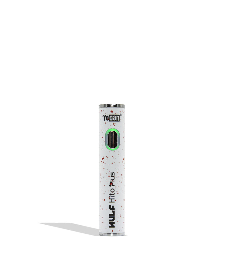 Yocan WULF Mods Hito Plus vape device 510 battery with a glowing green power button, standing upright on a white background with a soft shadow. WHite red spatter