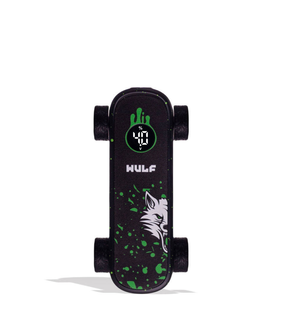A miniature black skateboard with green splatter details, a white wolf graphic, and a digital LED display on the deck, shown on a white background.