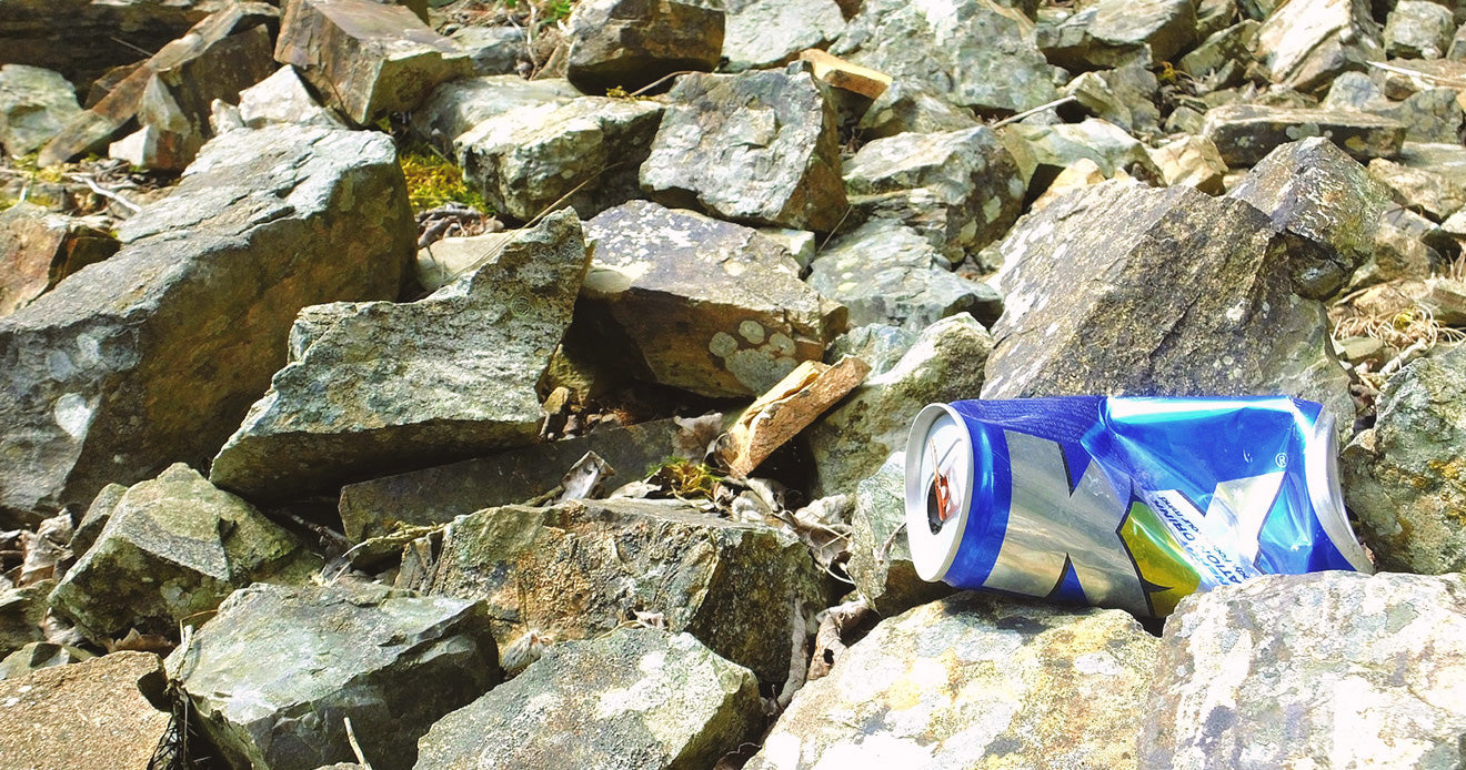 Litter amongst nature and rocks