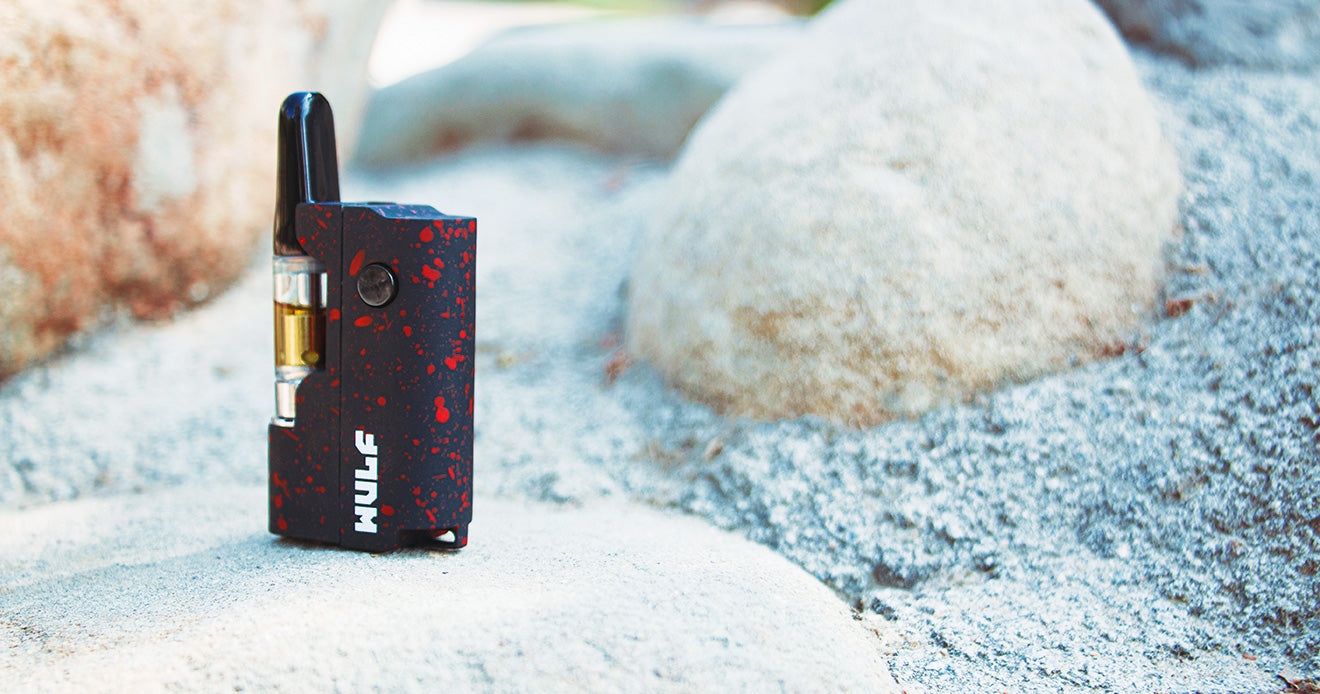 Black and red Wulf Micro Plus on top of concrete