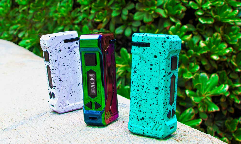 WULF Uni Pro 510 thread batteries in several finishes standing in front of greenery