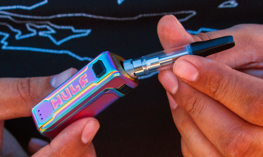 Wulf UNI S in hand with cartridge about to be placed