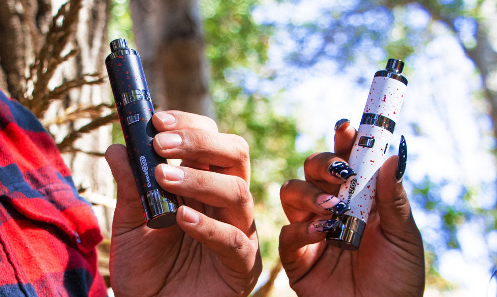 Wulf Evolve Maxxx in hands in front of trees and nature