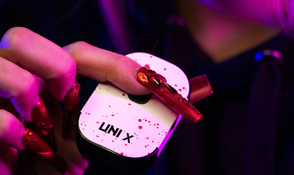 White Red Spatter Wulf UNI X held by woman with nice hands