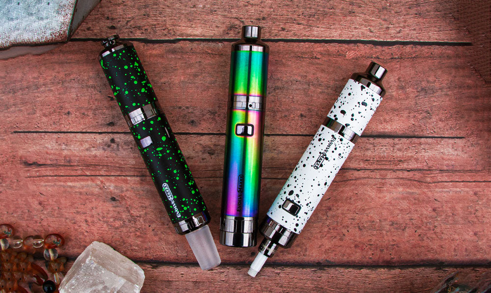 Wulf Evolve Maxxx in wax pen, dab rig and nectar collector mode on wooden texture