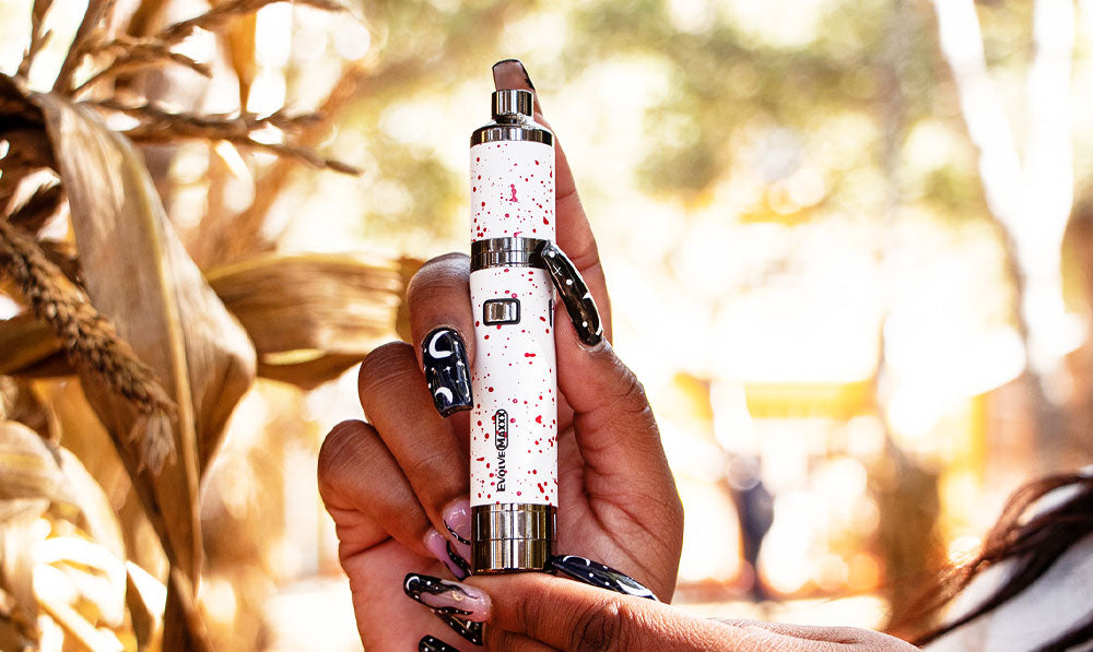 Wulf Evolve MAXXX in woman's hands in front of plants and bright natural lighting