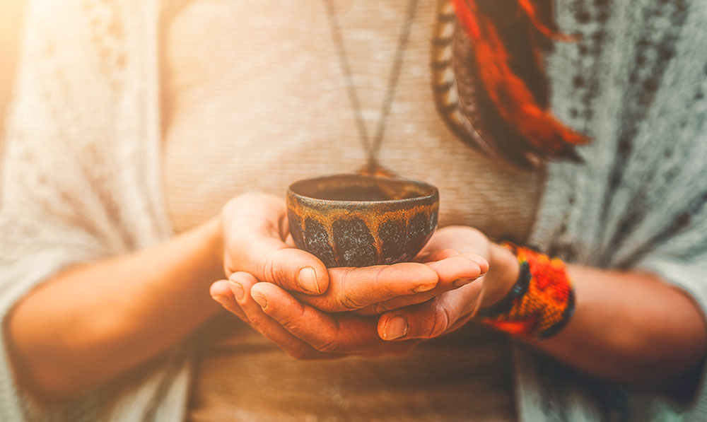 indigenous South American cultures vaporization woman holding cup