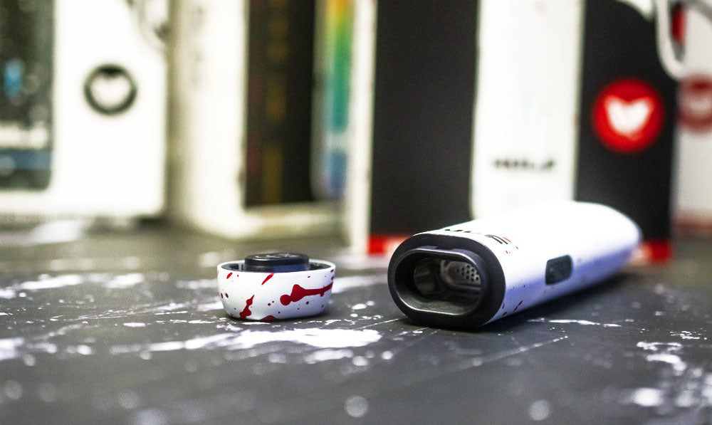 LX Slim resting on dark lightning surface with bright lighting