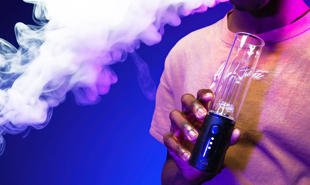 Person holding Wulf Pillar in front of blue background with smoke rising out of corner