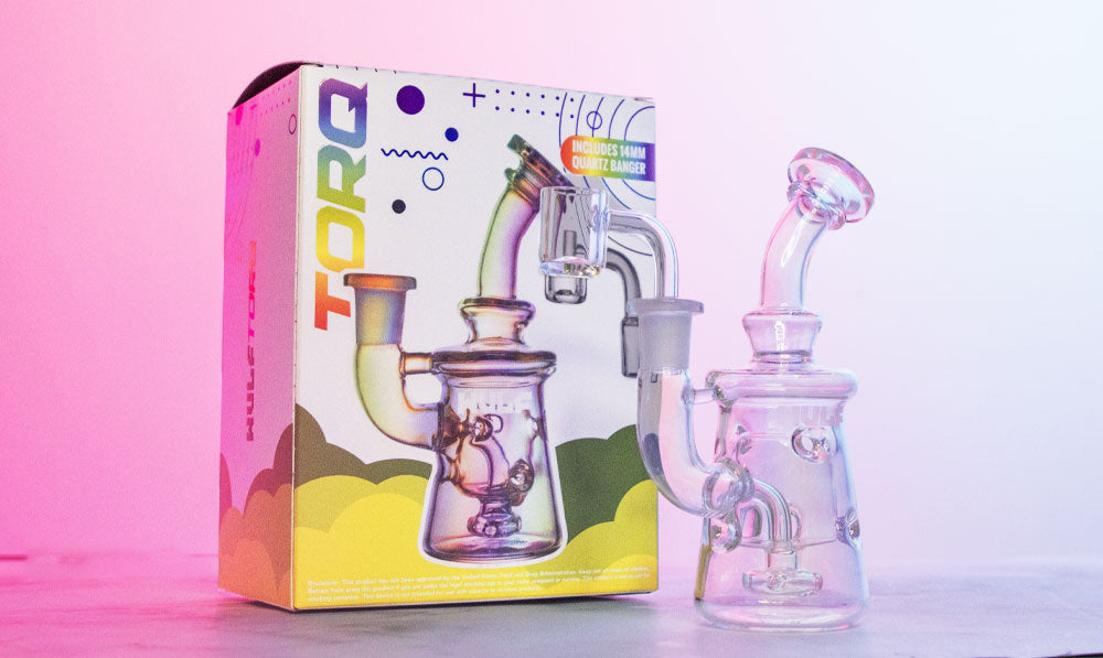 Close up of a WULF Torq recycler beside its retail box