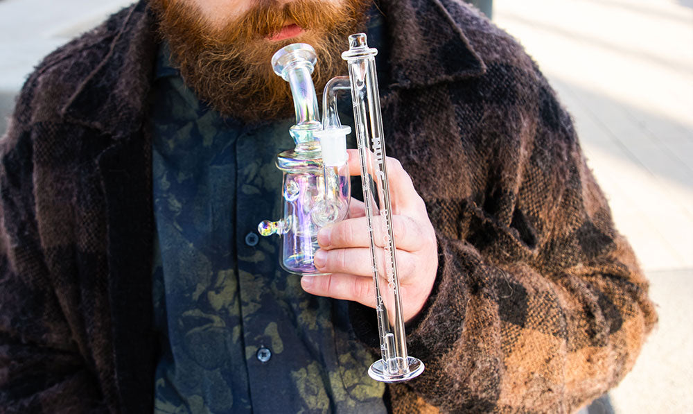 man holding Wulf Rig with Challenge Banger front view
