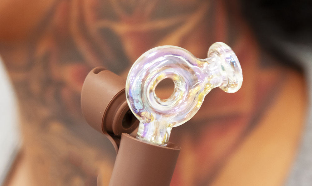 Woman holding Wulf Ring Pivot top attached to Pivot