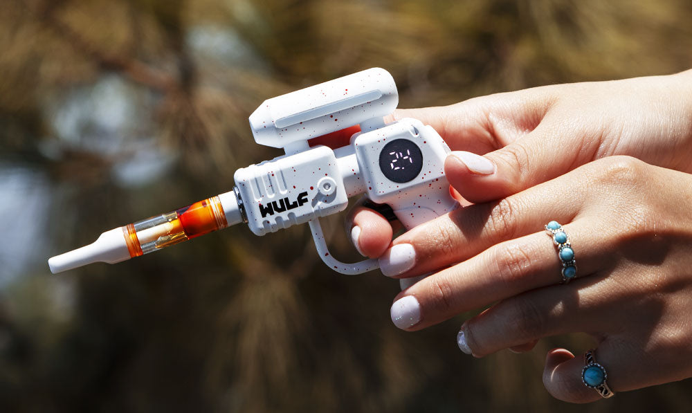 Woman holding Wulf Zapp like a gun
