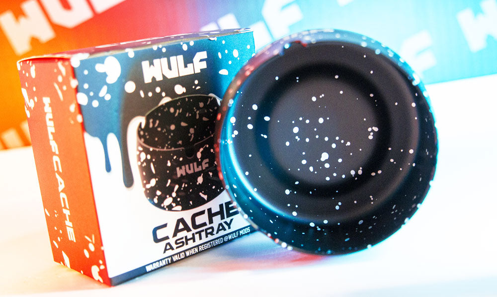 Inside of a WULF Cache ashtray next to its packaging