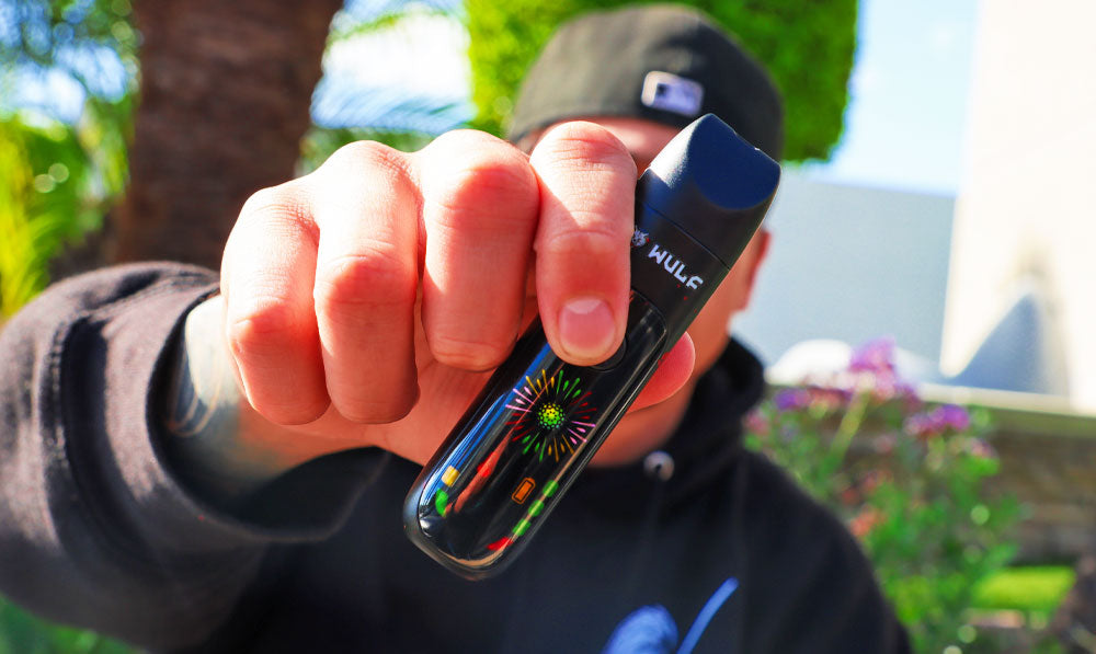 Man holding Wulf Budr in daylight