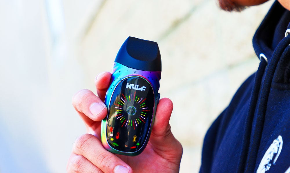 Man holding Wulf Faze with bright natural lighting