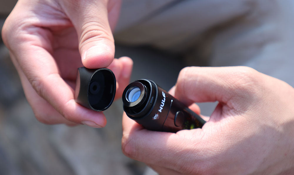 hands holding the Wulf Budr with opened mouthpiece
