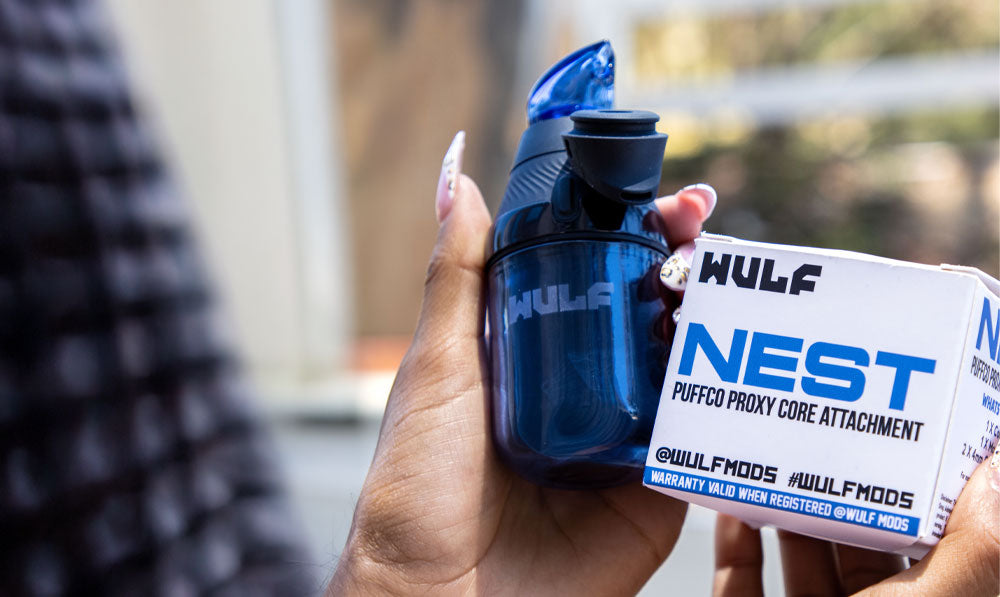 WULF Nest Puffco Proxy core attachment in blue with its retail box