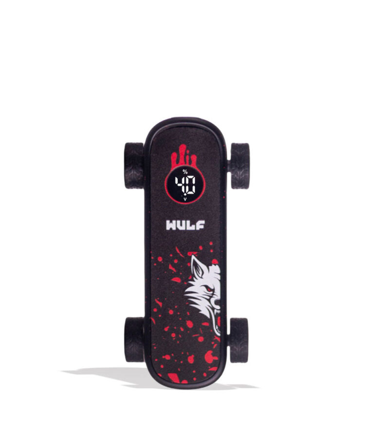 A miniature black skateboard with red splatter graphics, a white wolf head graphic, and a circular red and black logo near the front. The brand name 'HULF' is printed in white below the logo.