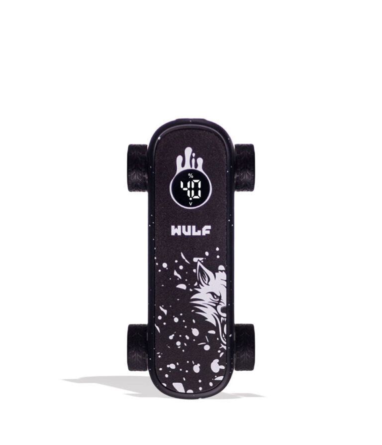 A miniature black skateboard with white graphics, including a wolf head, paint splatters, and the brand name 'WULF' on the deck, shown against a plain white background.