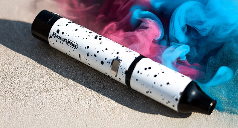 Evolve Plus on concrete with colorful smoke clouds
