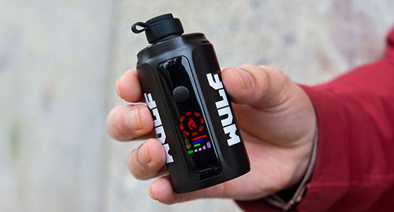 hand holding wulf growler