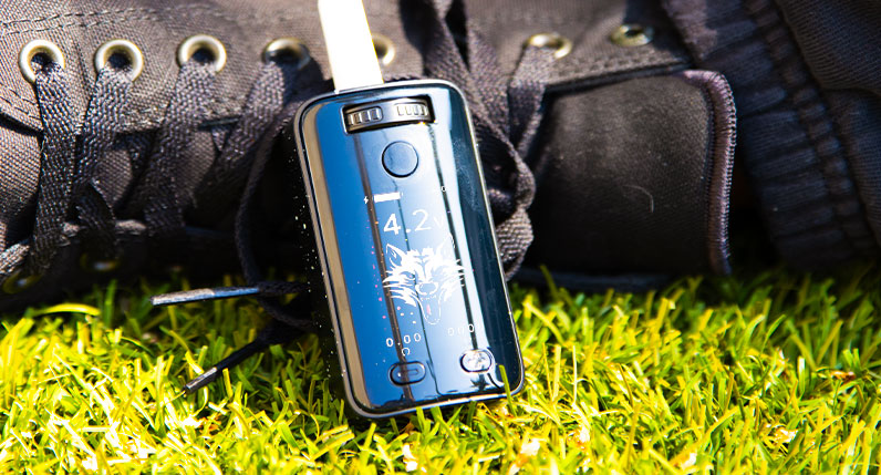 man laying with the Wulf UNI 3.0 on grass