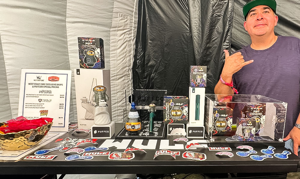 Wulf table at West Coast Cure Spaceship featuring WCC X Wulf Collab Astro Puffco Glass